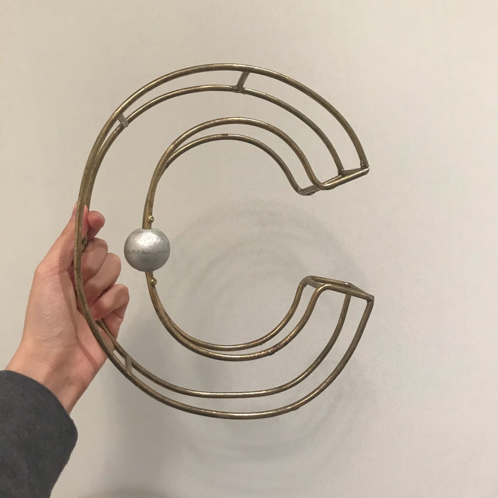 Bronze letter C decorative piece